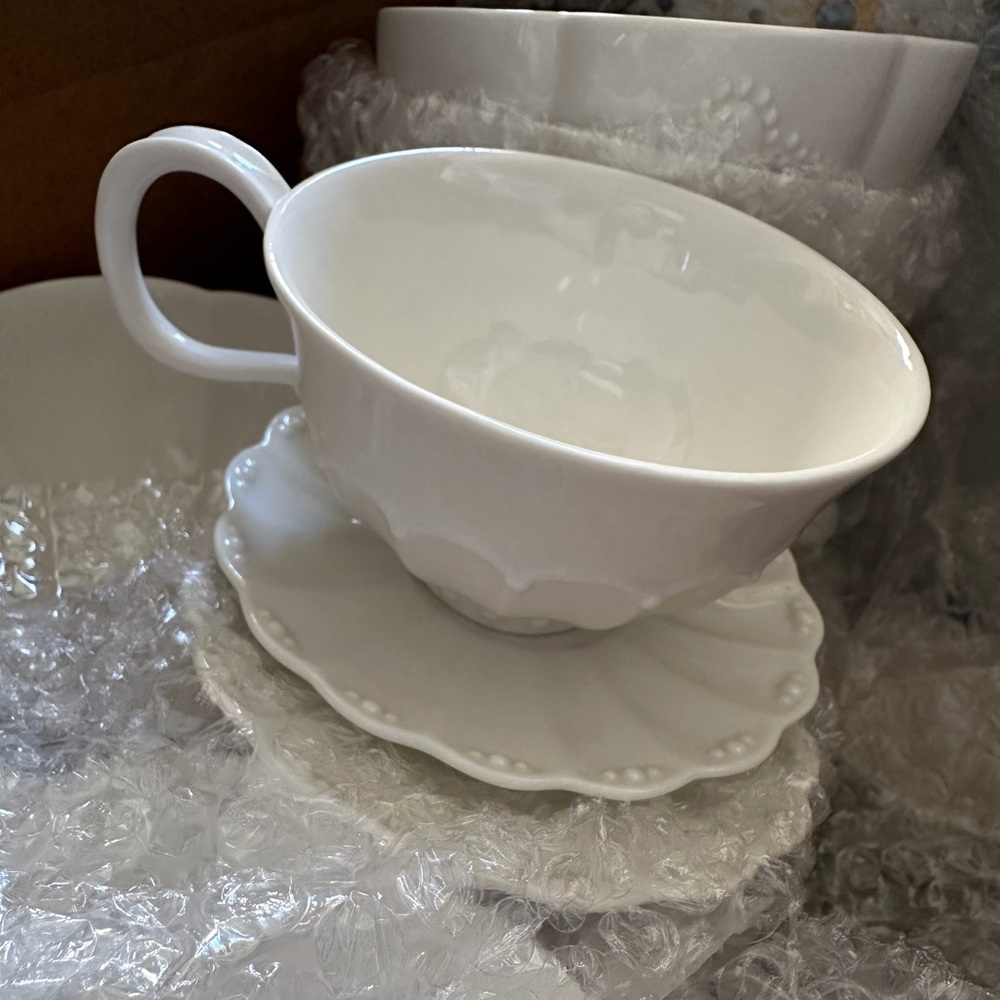 Set of (4) Elegant White Teacup and Saucer Set
